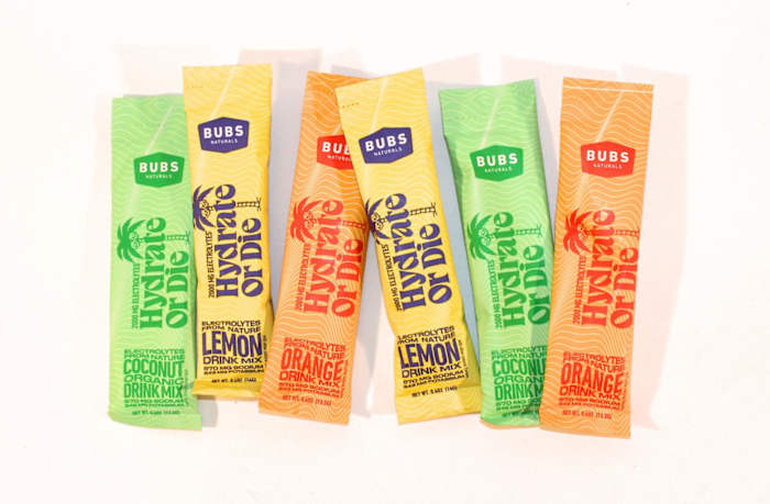 BUBS Naturals electrolyte travel packs in various flavors against a white background